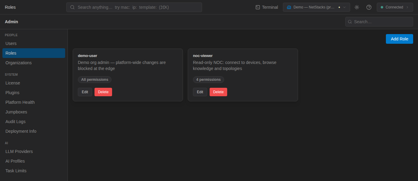 Roles page showing role cards with description, permission count, Edit and Delete buttons